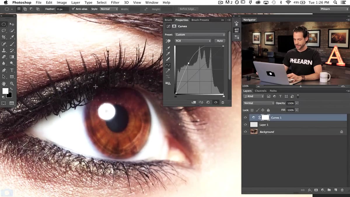 Elliptical marquee tool active, selection being drawn over the eye