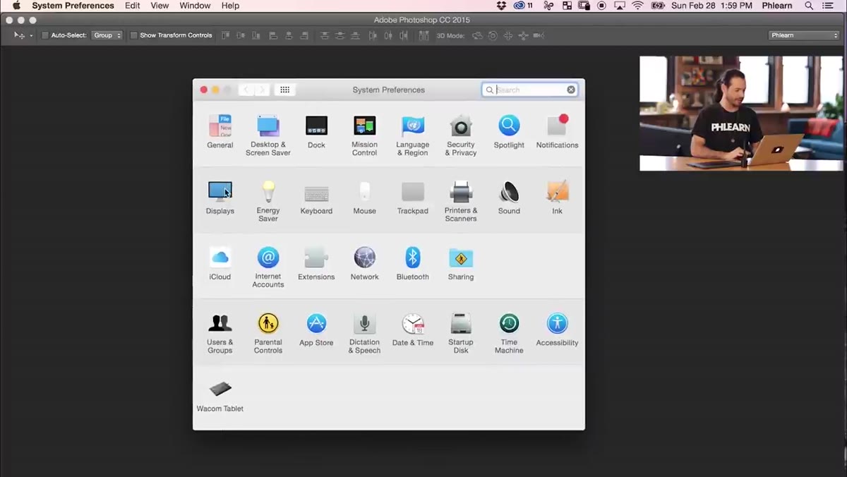 Mac Display preferences open showing resolution settings