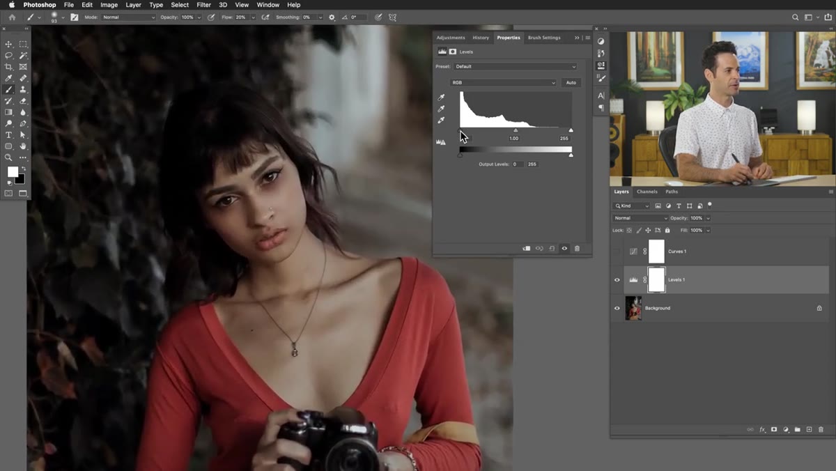 Dragging the black point slider to the right under the histogram