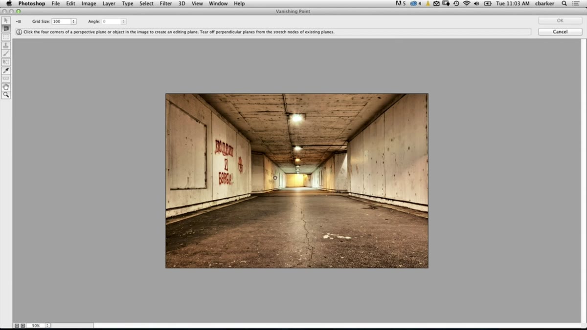 User drawing the first perspective plane grid over the image