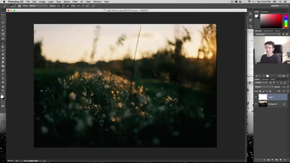Eyedropper tool sampling warm color near sun area of photo