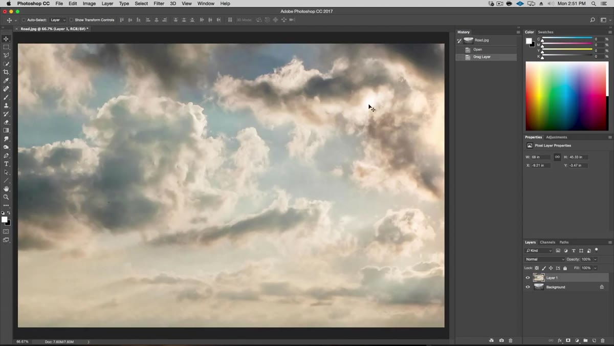 Sky layer being dragged into road document with Move tool