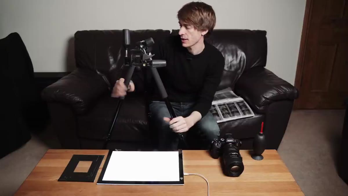 Tripod arm extended horizontally, camera pointing straight down