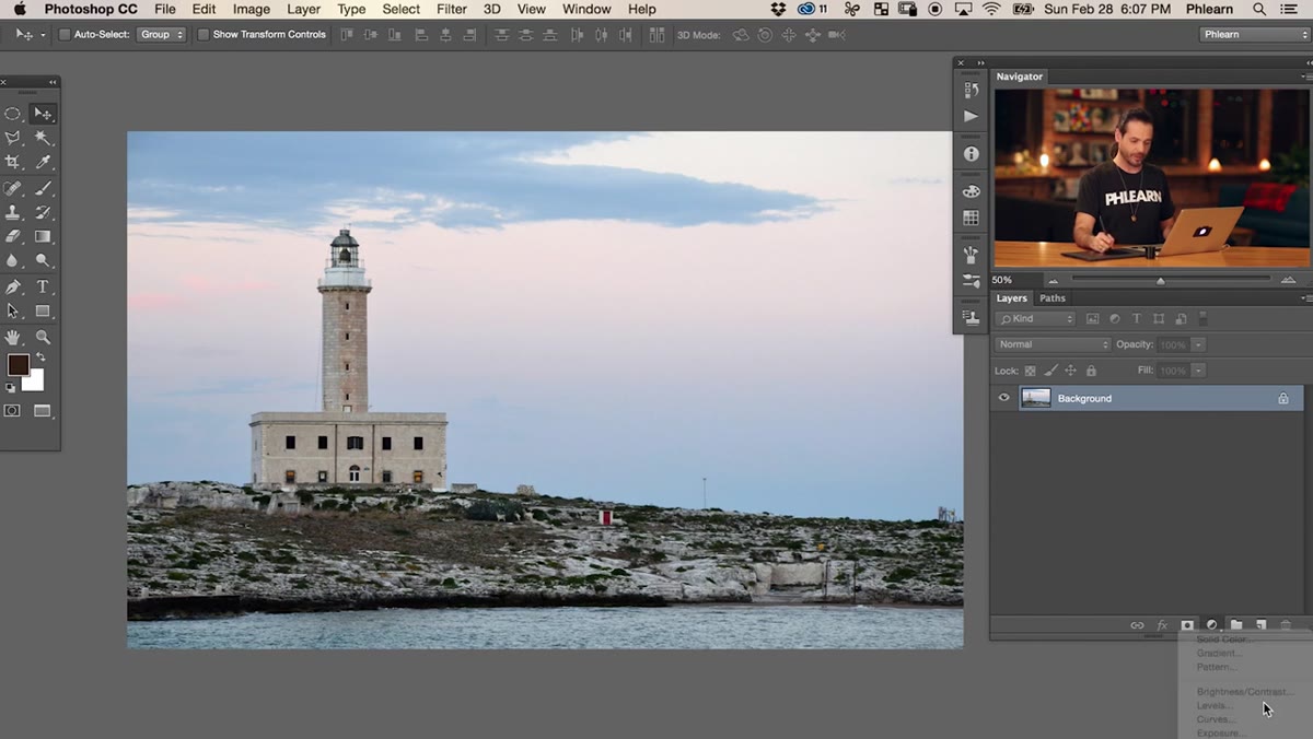 Levels adjustment layer being added in the Layers panel