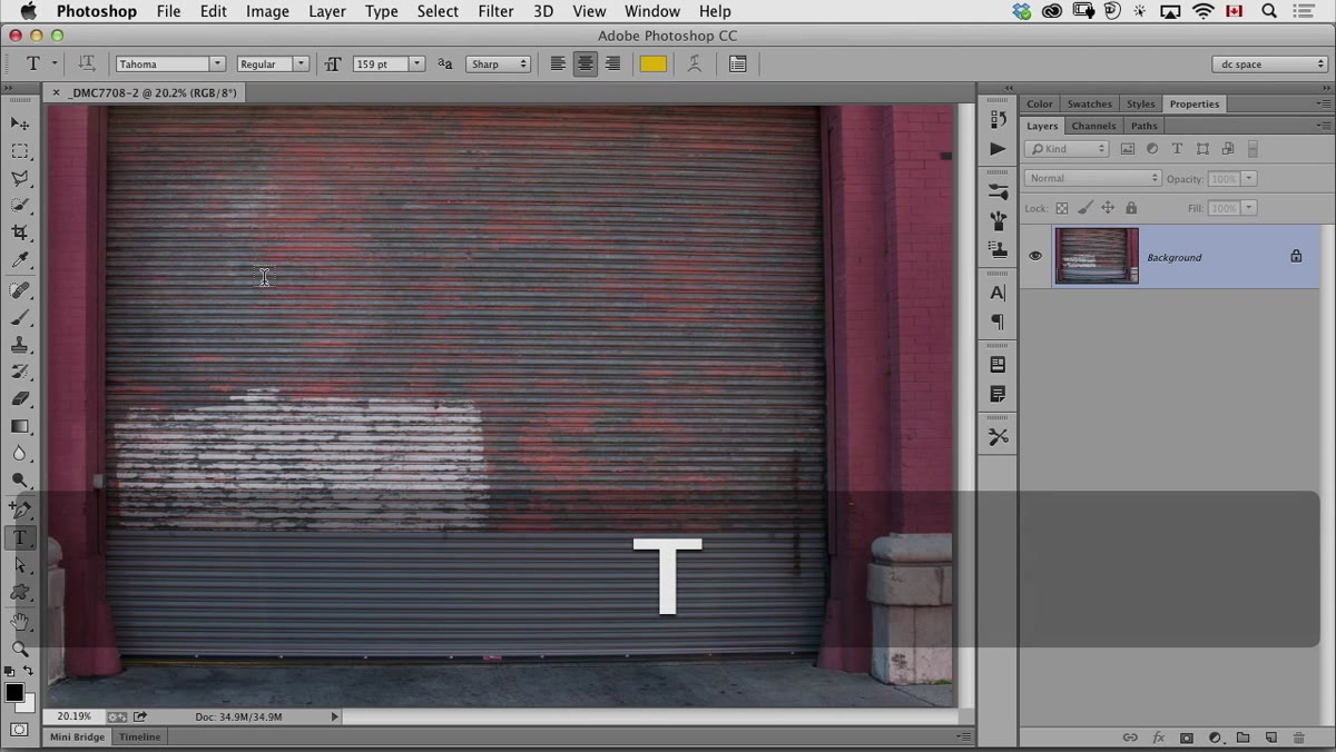 Large bold text typed over photo in Photoshop canvas