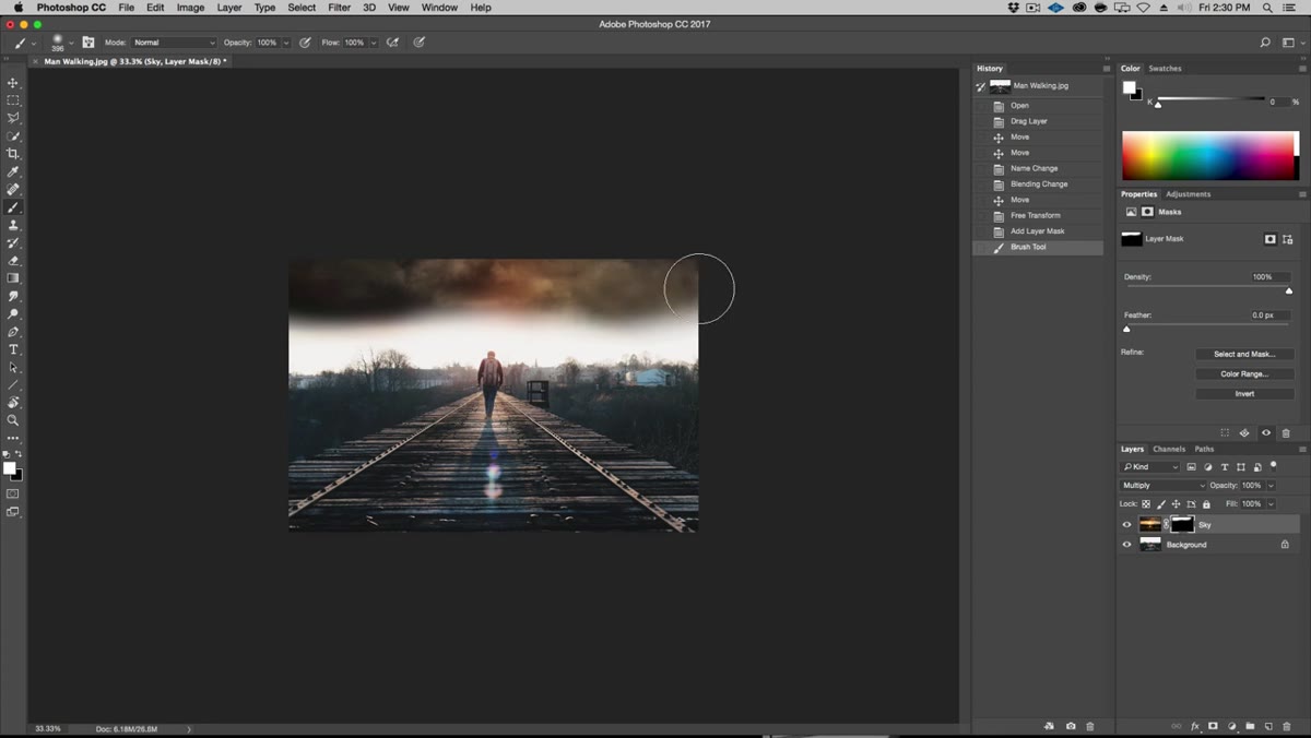 Custom rain brush being applied on a new layer above the photo