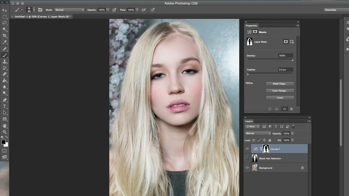 White and black brush being used to add and subtract from the hair mask