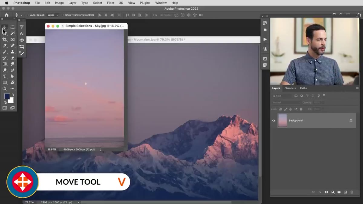 Move tool dragging sky image onto mountain photo